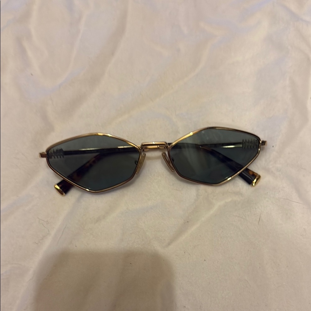 Miu Miu Gold and Black Women's Glasses
